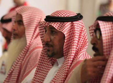 Saudi men await a chance to cast their votes in local elections yesterday. Yesterday's ballots were the last to exclude female voters.