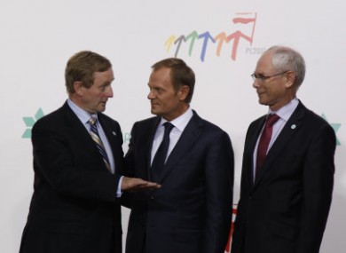 Enda Kenny, left, speaks with European Council President Herman Van Rompuy, right, and Poland's Prime Minister Donald Tusk, centre in Warsaw yesterday