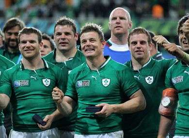 Brian O'Driscoll and his team-mates celebrate after the game.
