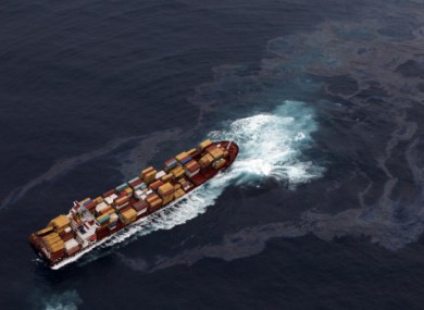 The Rena pictured struck aground on a reef off the coast of New Zealand last week.