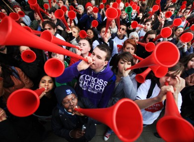 Supporters of Stop Climate Chaos blowing vuvuzelas outside the Dail today to express their frustration at the slow pace of political action to combat climate change