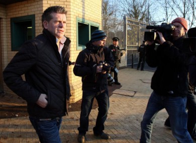 Brian Shivers leaves Antrim Crown Court, where he denies charges of murder and attempted murder following the murders of Sappers Patrick Azimkar and Mark Quinsey. His co-accused is Colin Duffy.