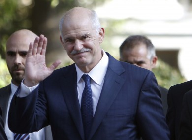 Outgoing PM Papandreou leaving the presidential palace yesterday