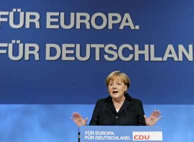 Angela Merkel gave her hour-long address to CDU delegates in front of a display reading: 'For Europe, for Germany'.