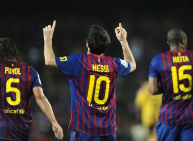 Messi celebrates scoring against Zaragoza.