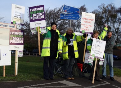 Workers from the East Anglian Ambulance Service picket an entrance to the Queen Elizabeth Hospital in Kings Lynn, Norfolk
