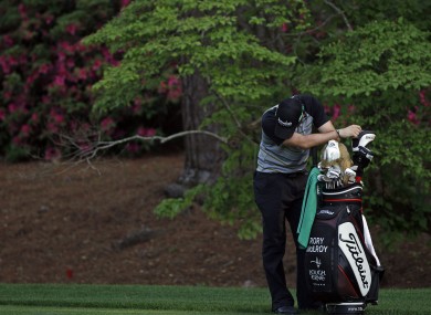 Rory takes a moment to himself after blowing his lead during the final round of the US Masters at Augusta.
