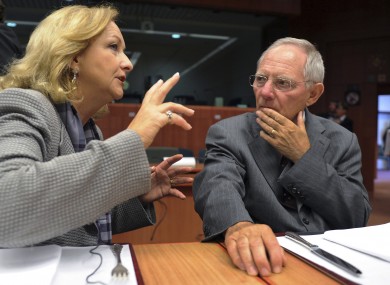 Wolfgang Schauble speaks with his Austrian counterpart Maria Fekter at an EU summit earlier this year.