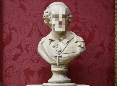 For his latest work, controversial artist Banksy has sawn off the face of an 18th century stone bust and glued on a selection of bathroom tiles, depicting the cover-up of the church's abuse scandal. On display in Liverpool, it's entitled 'Cardinal Sin'.