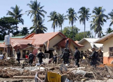 Police and volunteers continue the search for flood victims today.