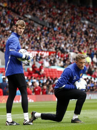The two players warming up at Old Trafford.