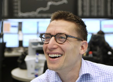 File photo of a trader on the German stock exchange in Frankfurt.