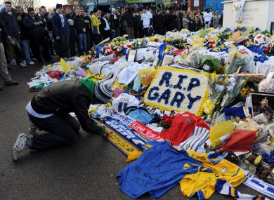 Fans lay tributes in memory of Gary Speed outside Leeds United's home ground, Elland Road (file photo).