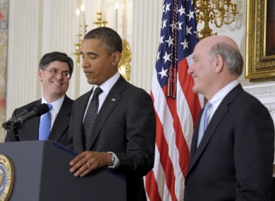 Jacob Lew (left) smiles over at Bill Daley (right), as Barack Obama announces Daley's retirement as Chief of Staff.
