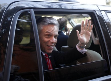 Jon Huntsman waves to supporters in South Carolina yesterday.