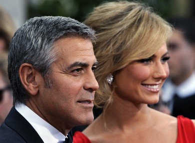George Clooney and Stacy Keibler arrive at the 69th Annual Golden Globe Awards last night. Clooney won Best Actor