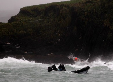 Naval Divers off Adam Island in west Cork, as the search continues for five people who went missing on Sunday.