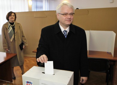 Croatia's president Ivo Josipovic casts his ballot at a polling station in Zagreb, Croatia today.
