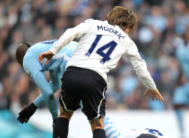 Balotelli 'falls' over Scott Parker.