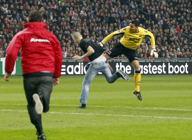 Esteban Alvarado defends himself during December's last 16 clash with Ajax