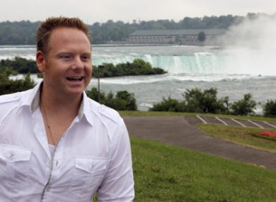 Tightrope walker Nik Wallenda poses near the Niagara Falls in August 2011.