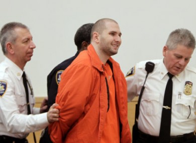 Maxim Gelman, centre, is briefly removed from court today after one of several outbursts.