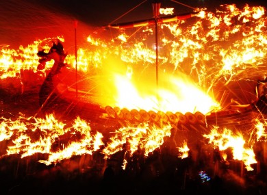 A Viking galley is set on fire during the Up Helly Aa Viking festival, in Lerwick on the Shetland Isles