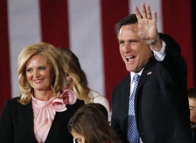 Mitt Romney greets supporters with his wife Ann at his Nevada caucus night victory celebration party in Las Vegas.