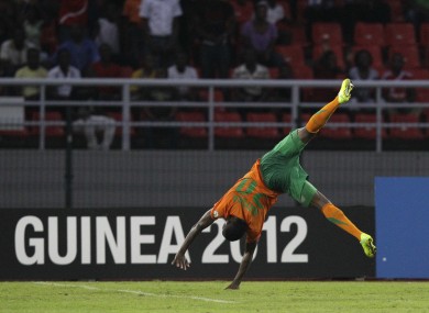 Zambia's Emmanuel Mayuka does a cartwheel after scoring against Ghana. Zambia won 1-0 to qualify for Sunday's final