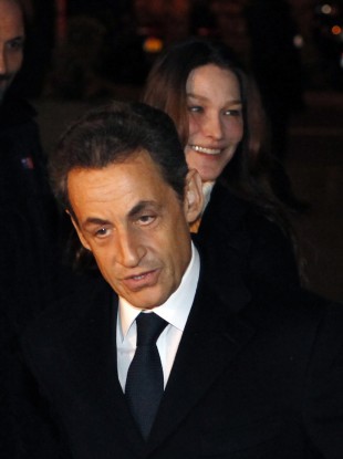 Sarkozy with wife Carla Bruni, arrives for an interview with French TV announcing his re-election bid.