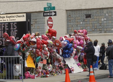 Fans at a memorial outside the New Jersey church where Whitney Houston's funeral will be held on Saturday
