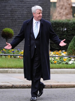 Lansley arrives for the meeting at Downing Street after being heckled by protesters outside the gates leading to No 10.