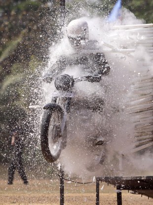 An Indian Army soldier displays his daredevil motorcycle skills during an army fair in Bhubaneshwar, India today.