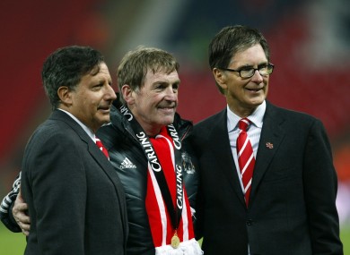 Liverpool's manager Kenny Dalglish, chairman Tom Werner, left, and owner John W Henry.