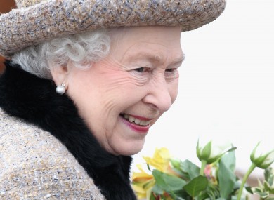 Queen Elizabeth smiles after attending Sunday service at a church in Norfolk yesterday.