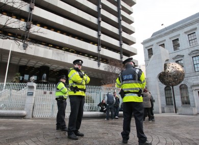 Gardaí and protesters outside the Central Bank today.