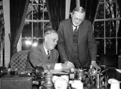 President Franklin D Roosevelt pictured filling in his census form in April 1940.