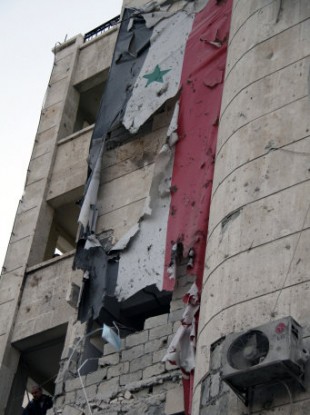 Photo dated 10 Feb, 2012 of damage in Aleppo after two car bombs exploded.