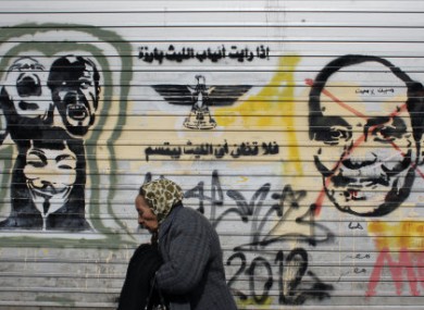 A mural in Cairo depicting military ruler Field Marshal Hussein Tantawi and the words:
