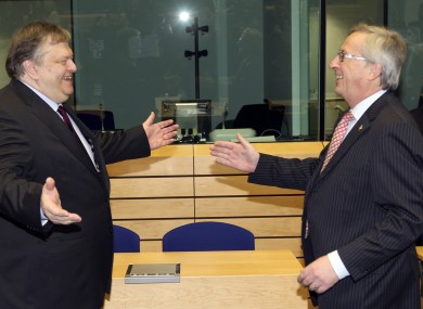 Eurogroup president Jean-Claude Juncker (right) might be happier to see Greek finance minister Evangelos Venizelos in future, after investors agreed to swap their bonds for lesser ones.