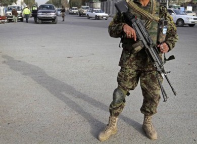 An Afghan soldier guarding a checkpoint in Kandahar province.