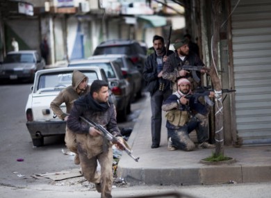 Syrian rebels during clashes with government forces in Idlib, northern Syria.