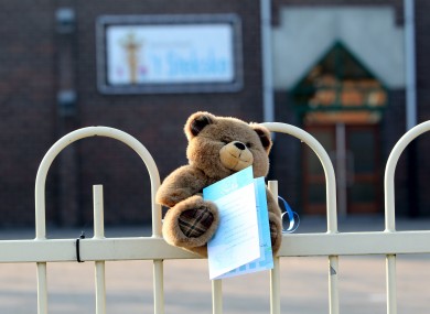 a teddybear at the entrance gate of the primary school 't Stekske in Lommel.