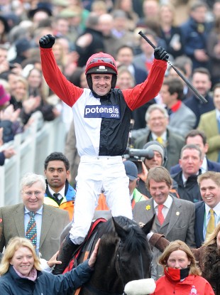 Jockey Ruby Walsh celebrates winning the Ladbrokes World Hurdle on Big Buck's.