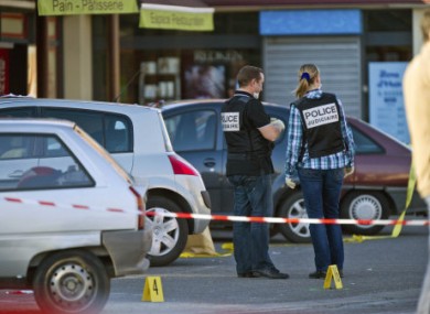Investigators on the scene of the shootings in Montauban.