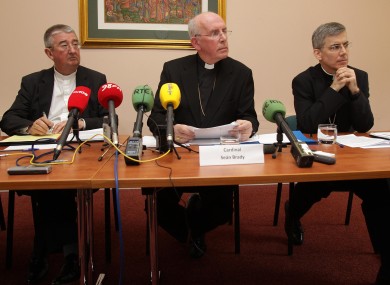Archbishop of Dublin Diarmuid Martin, Cardinal Sean Brady and papal nuncio to Ireland Archbishop Charles Brown during a press conference in Maynooth this morning.