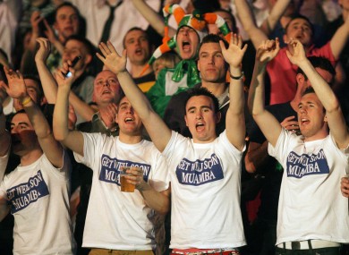 Darts fans show their support for the Bolton midfieler at the O2 Arena, Dublin last night.