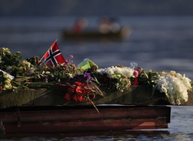 Flowers laid close to Utoya island in memory of the attack victims.