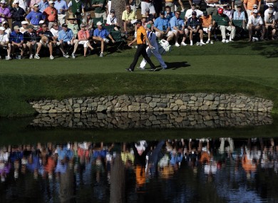 Peter Hanson walks down the 15th fairway.