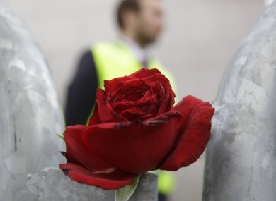 A rose to commemorate the victims of the attacks laid in front of the Oslo court.